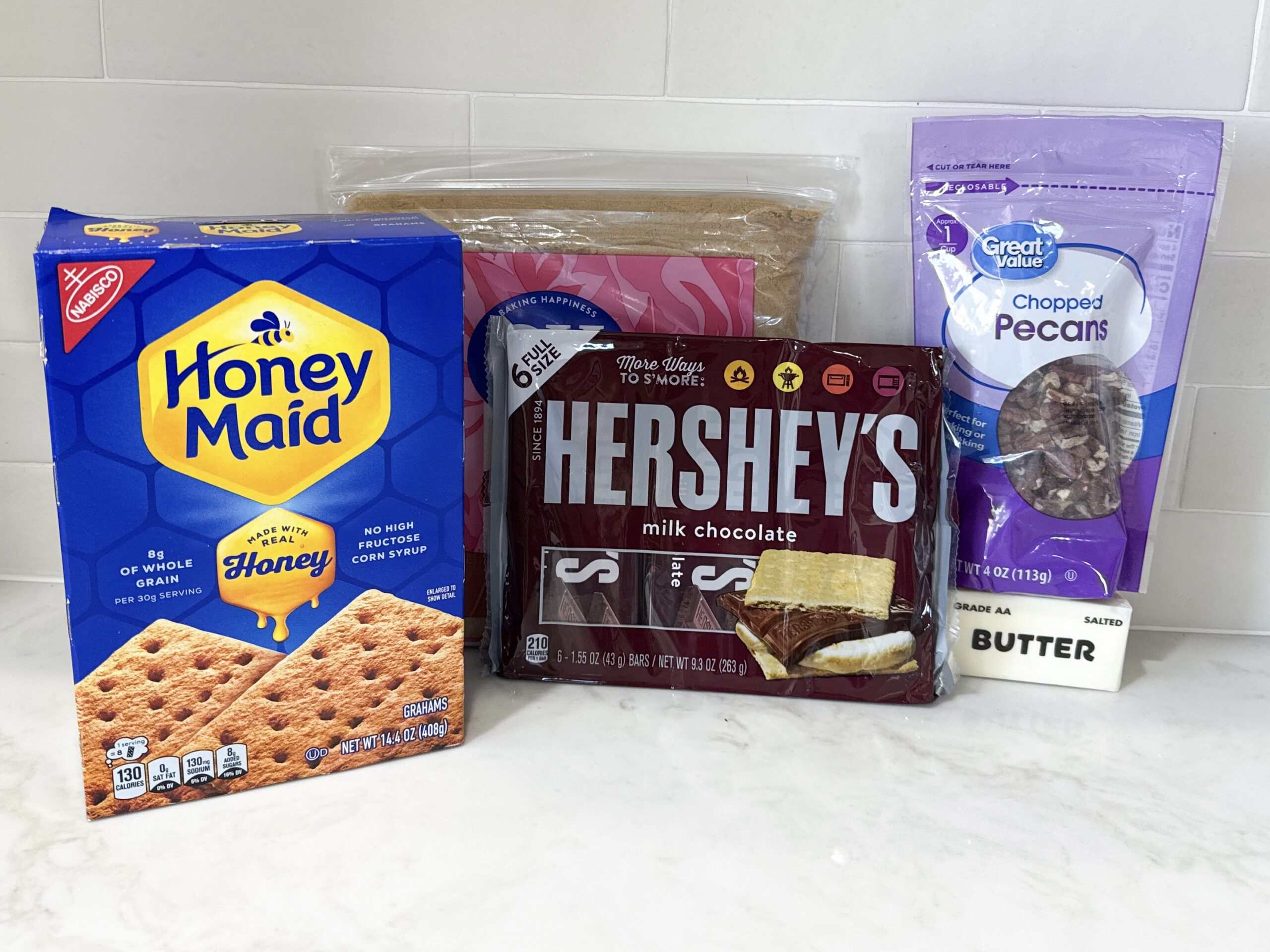 Ingredients for Christmas Crack Toffee Bars on countertop