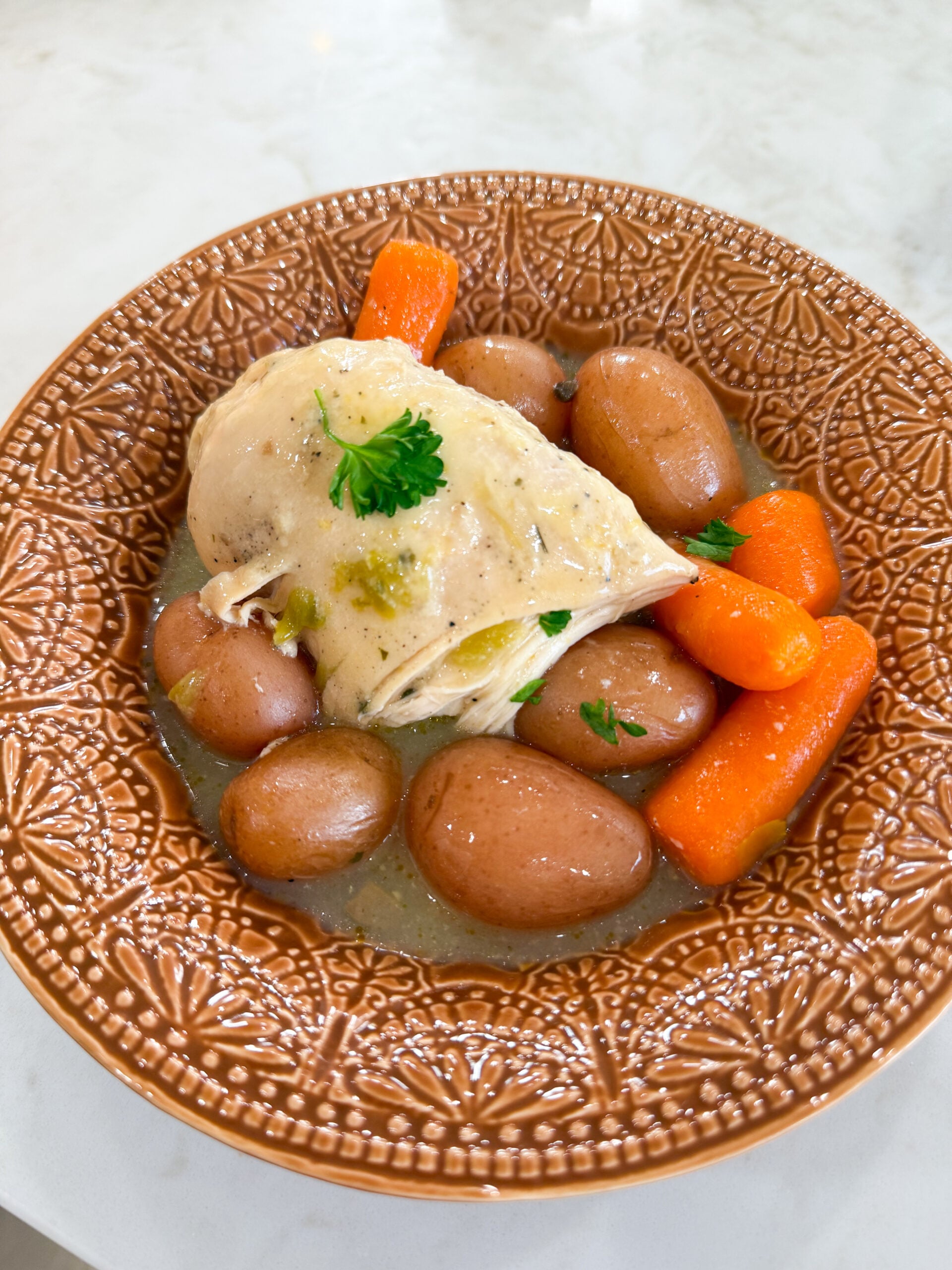 creamy green chili ranch chicken served in a bowl