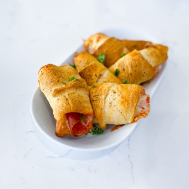 Golden baked pizza crescent pockets filled with cheese and pepperoni