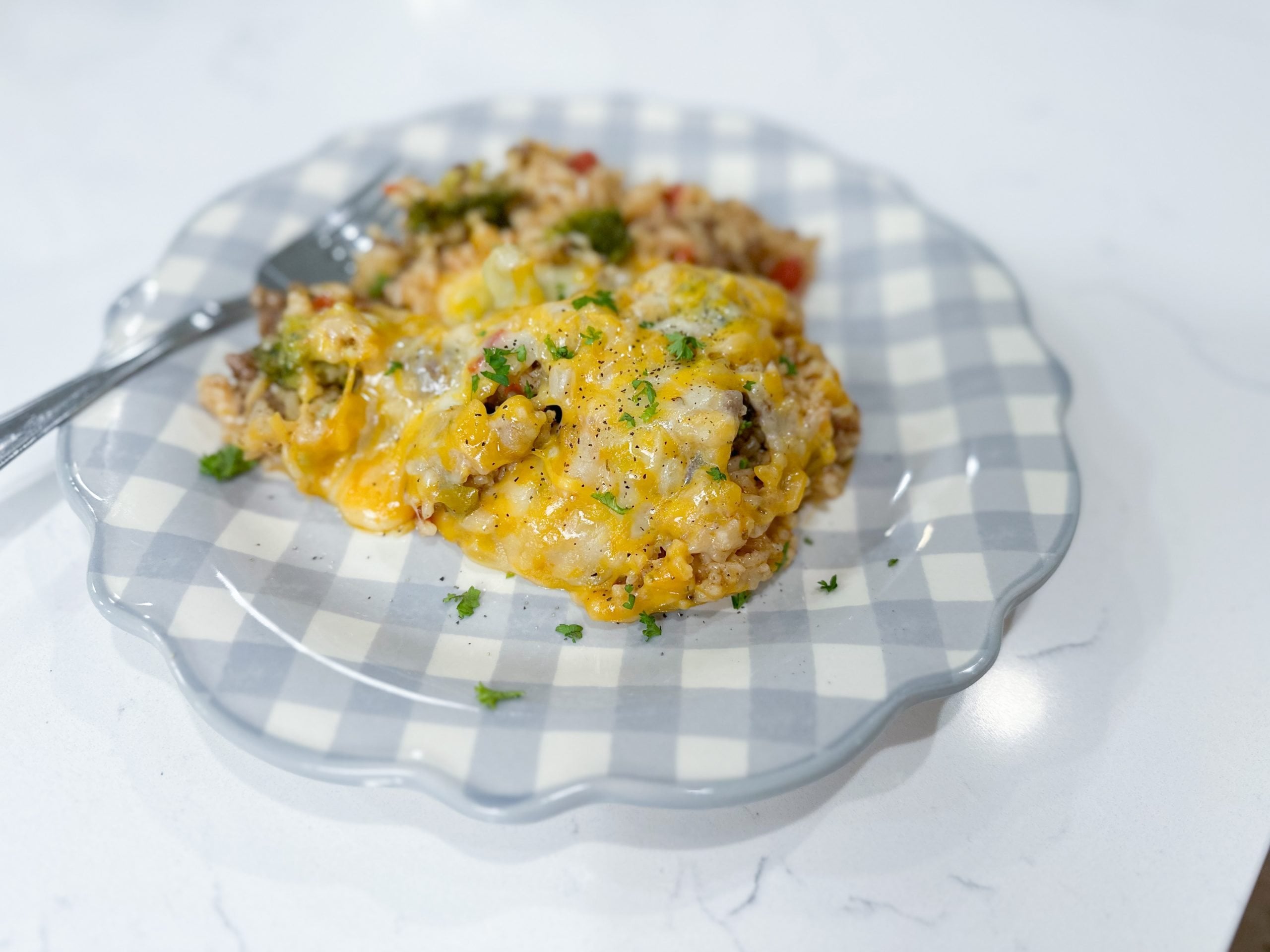 Mexican beef and rice skillet with ground beef, broccoli, and melted cheese
