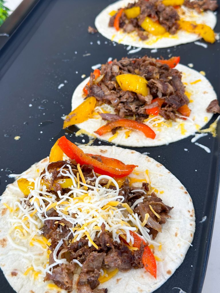 assembling steak fajita quesadilla
