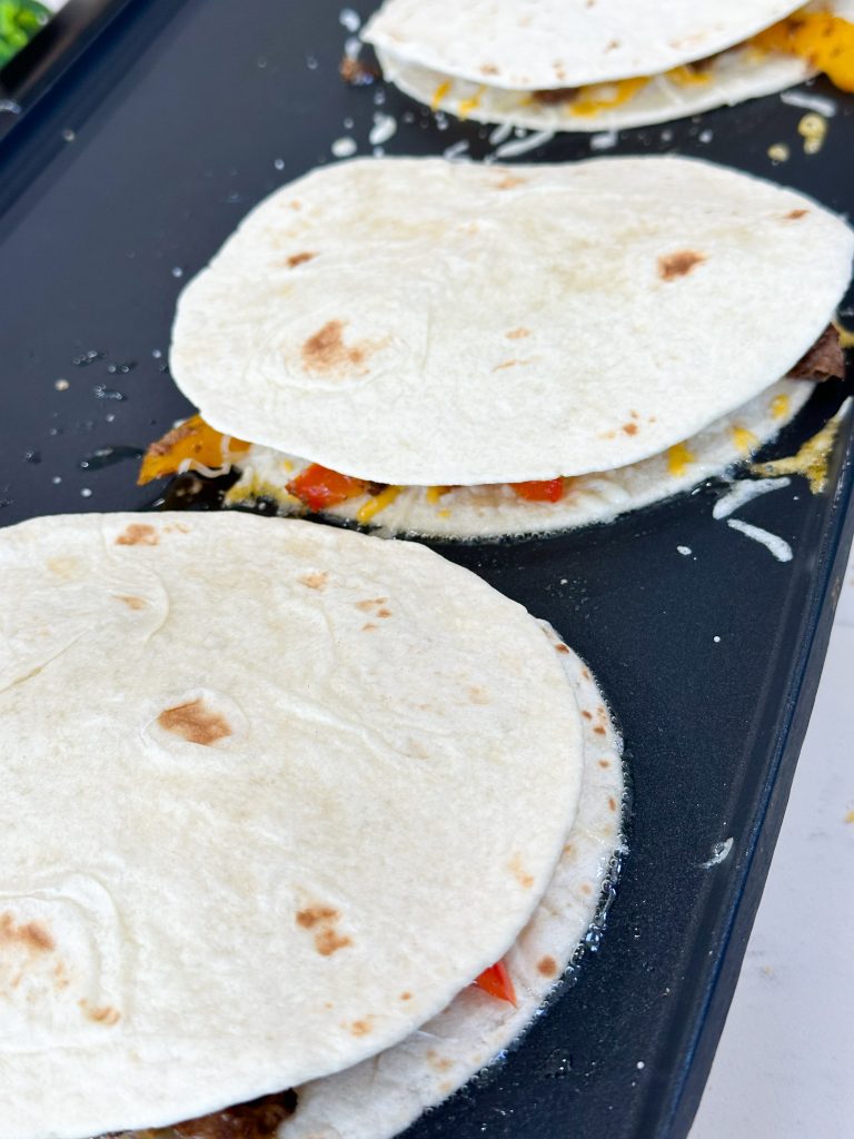 quesadilla cooking until crisp