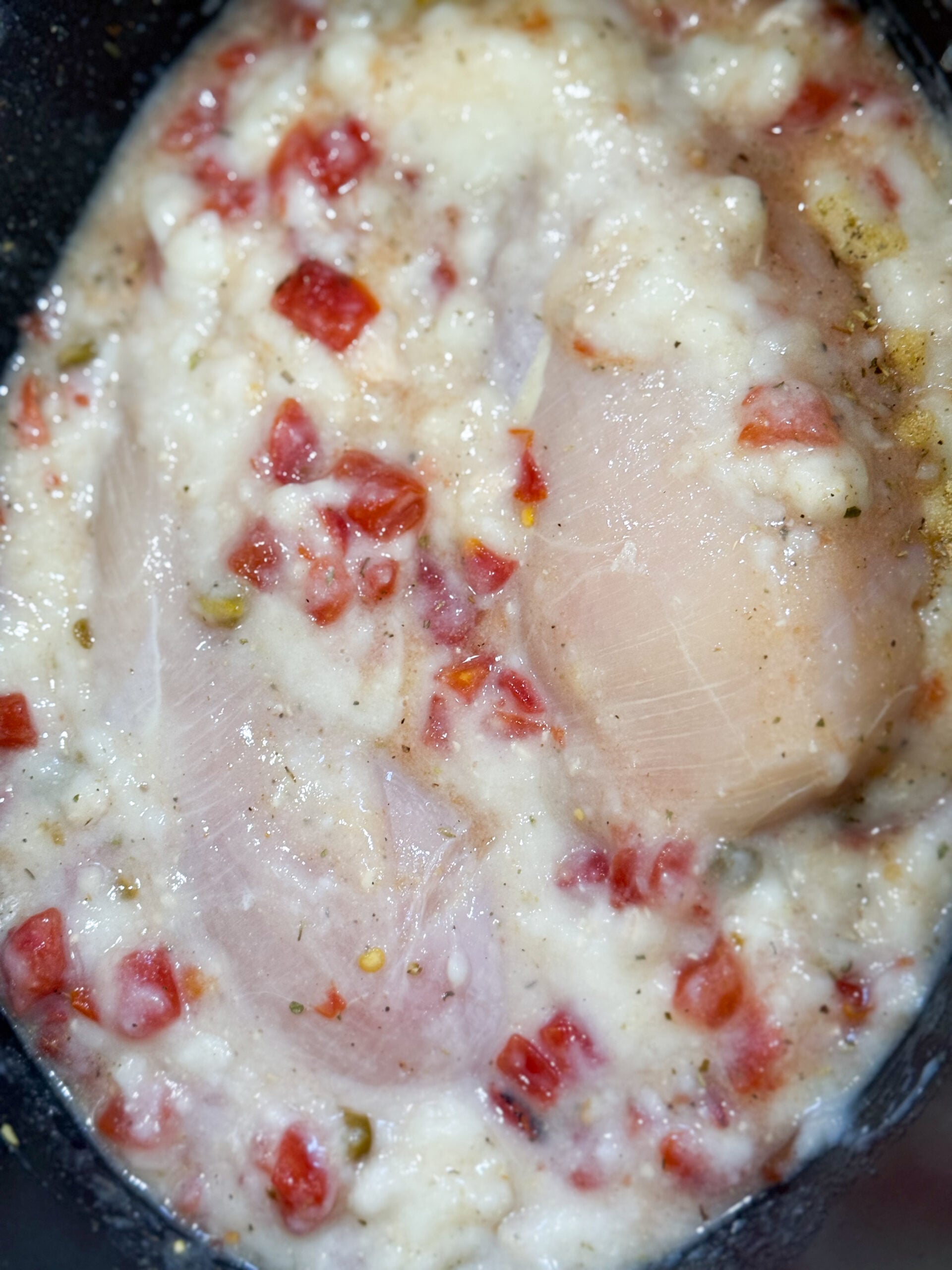 Chicken, soup, and Rotel in slow cooker