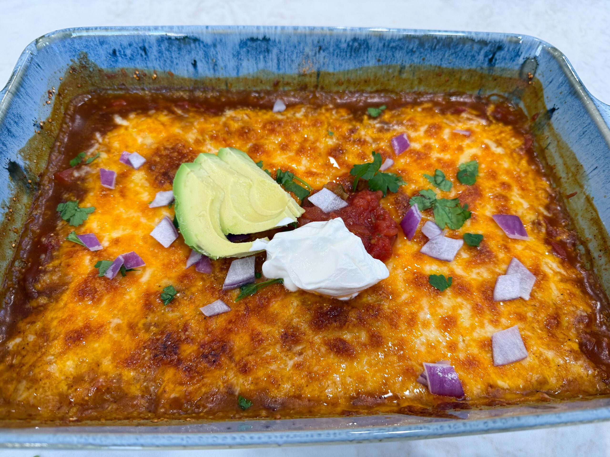 black bean casserole baked in a glass dish