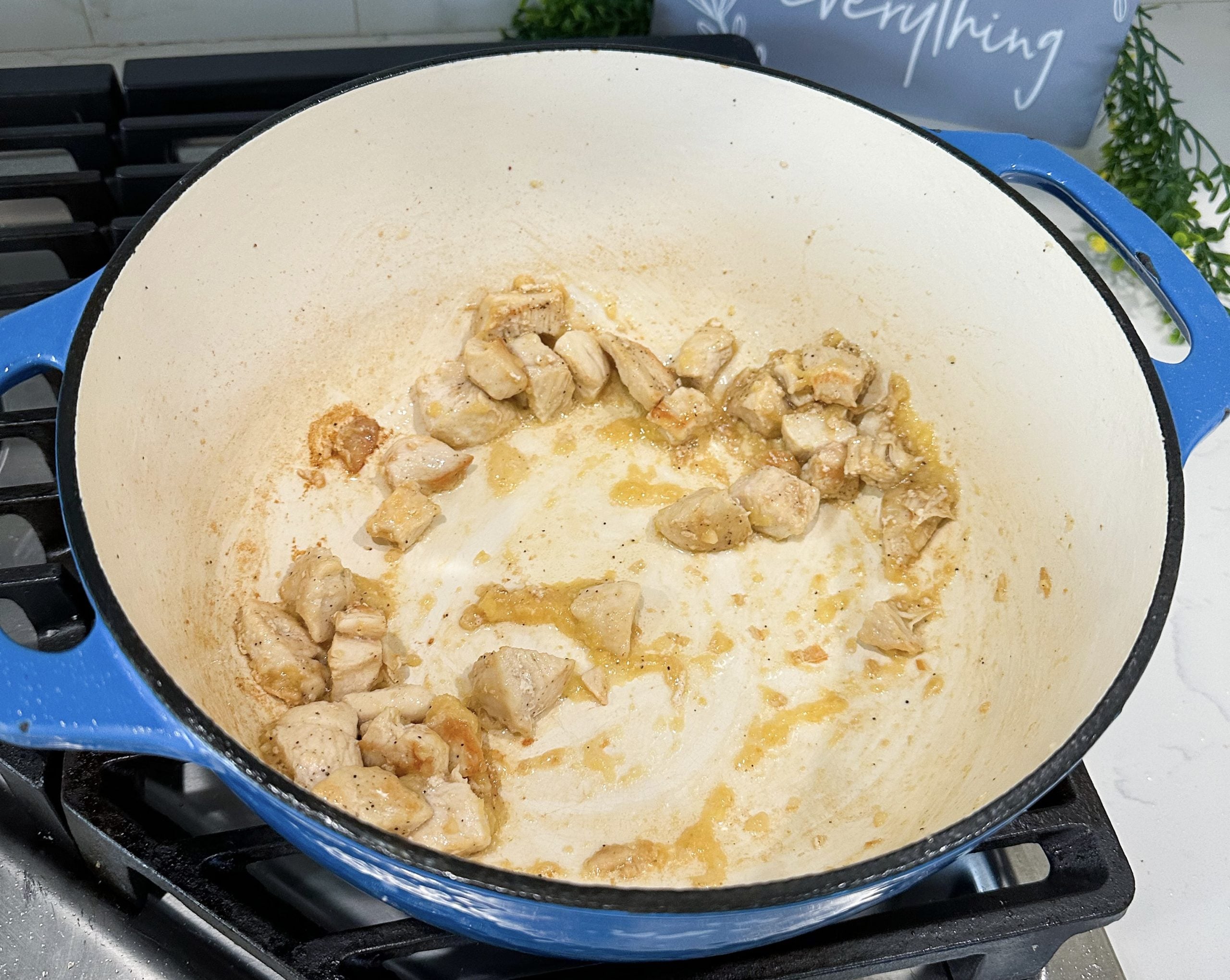 chicken cooking in a pot