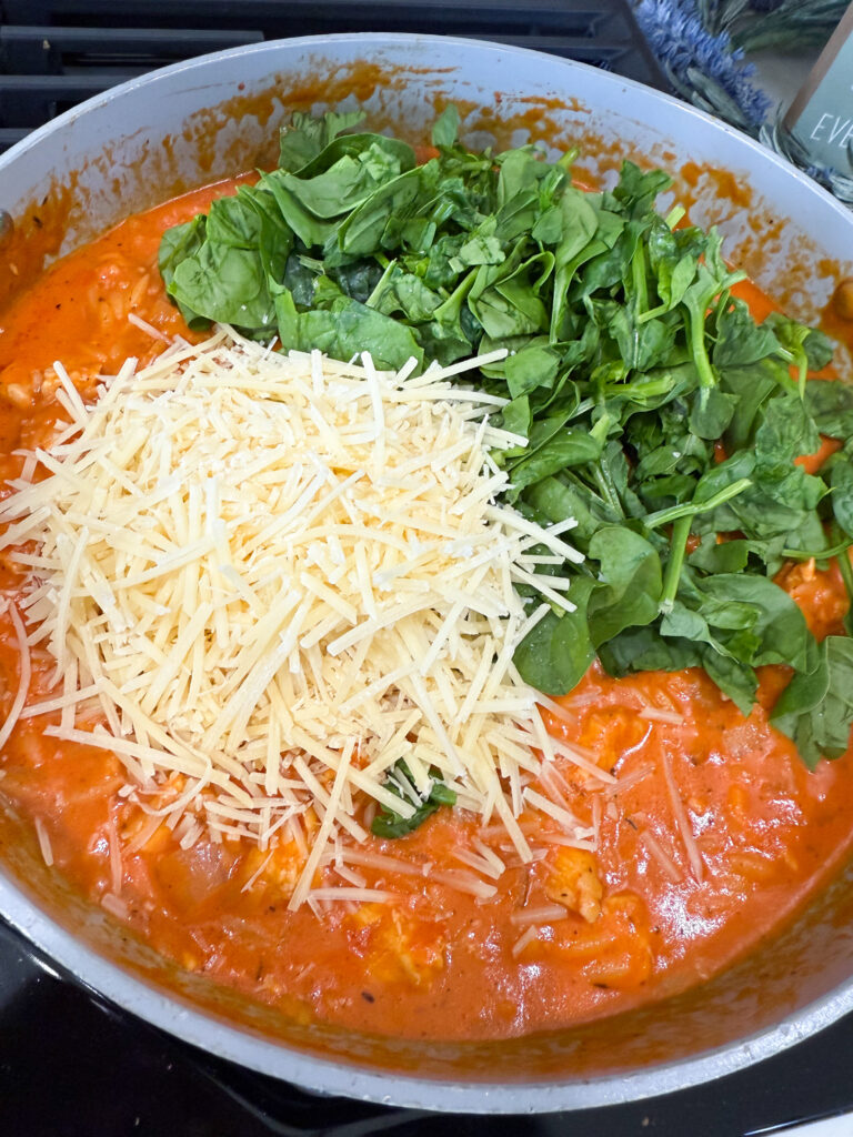 add spinach and parmesan to the orzo