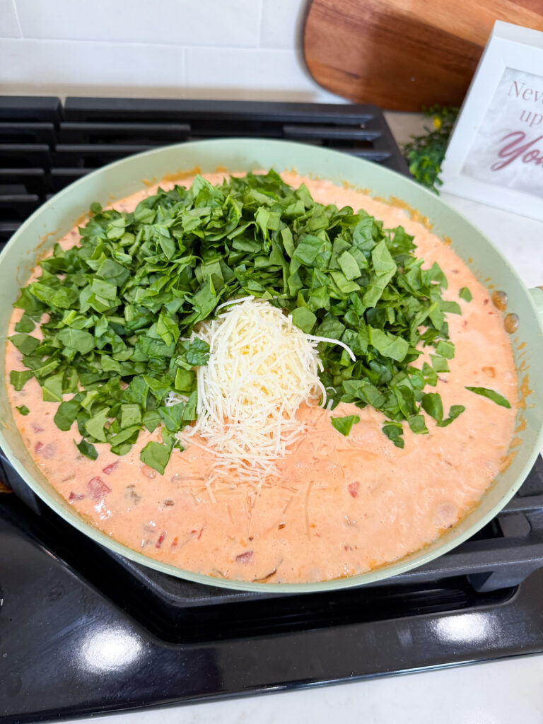 Add spinach to sauce