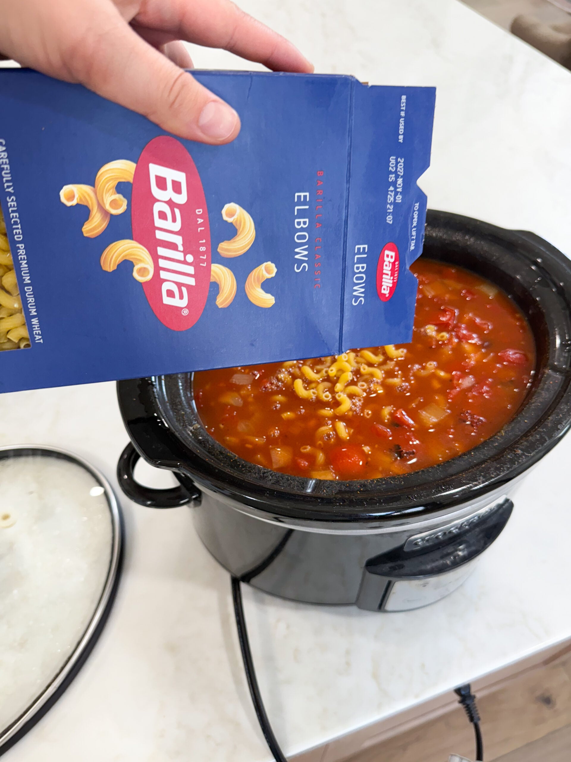pasta stirred into chili mixture