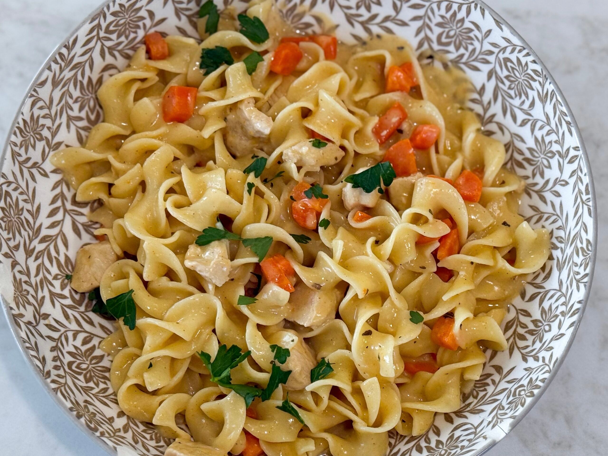 Creamy Chicken and Egg Noodles in a bowl.