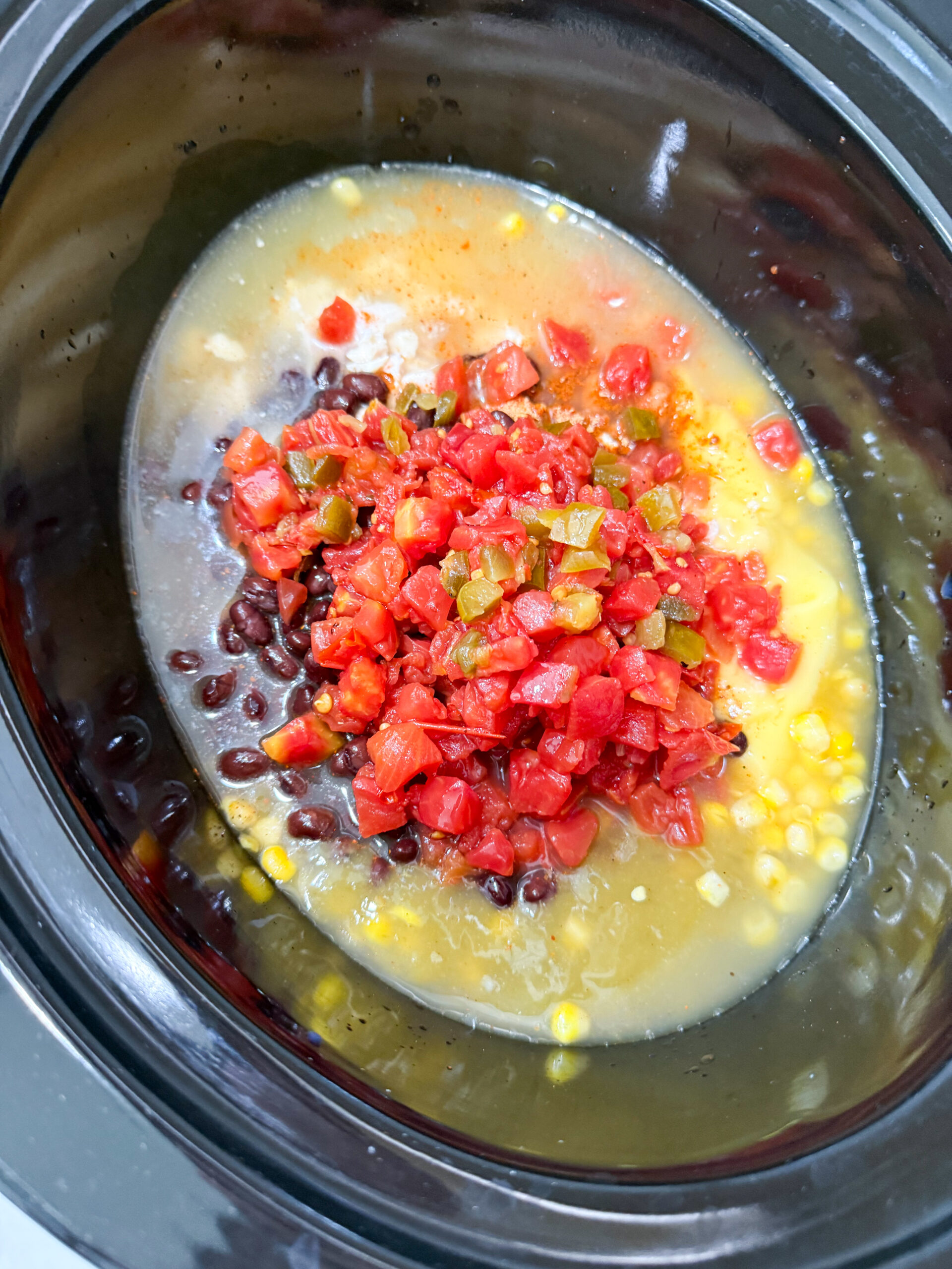 All 8 cans opened and poured into slow cooker