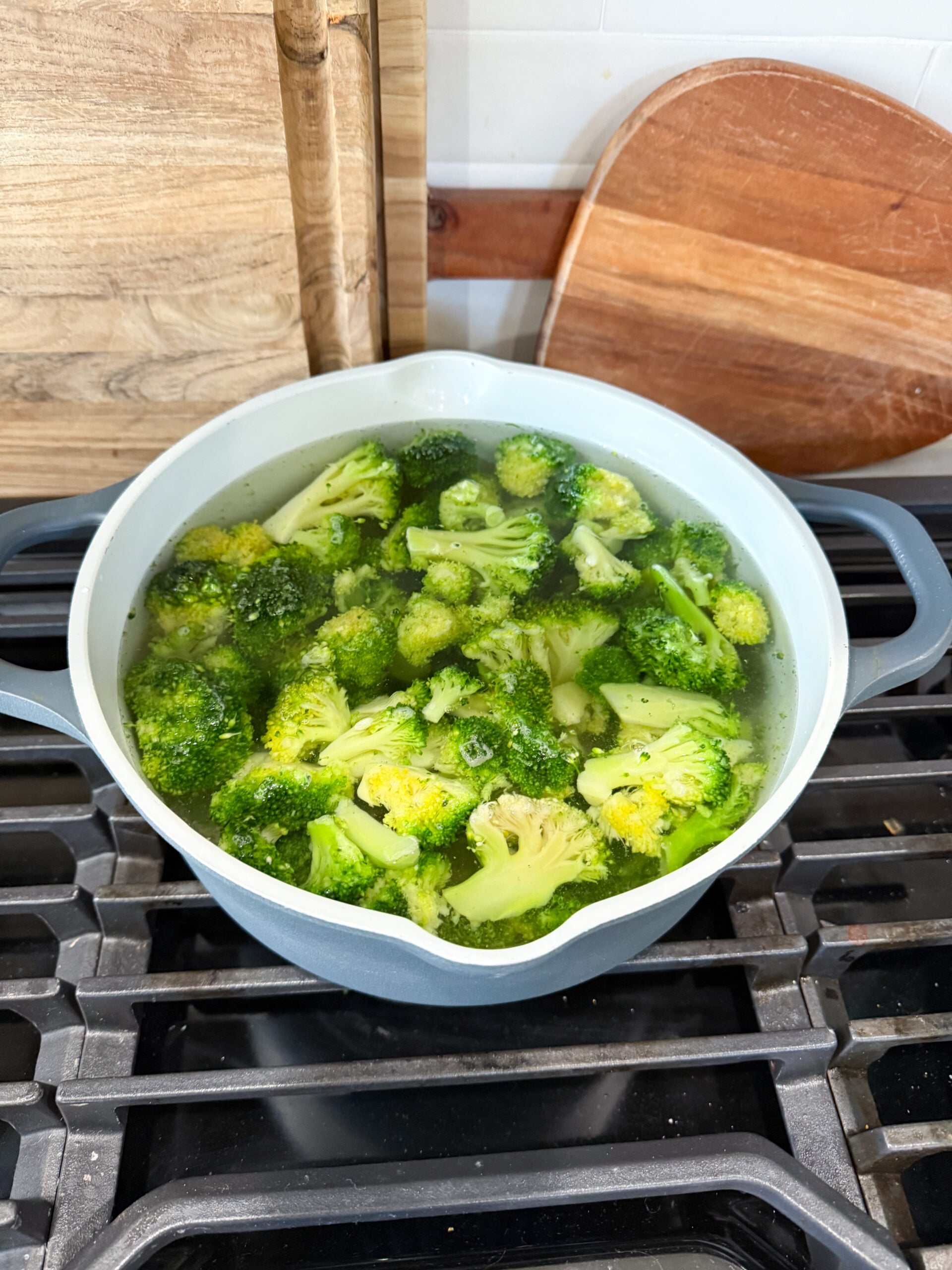 steamed broccoli in a pot on the stove