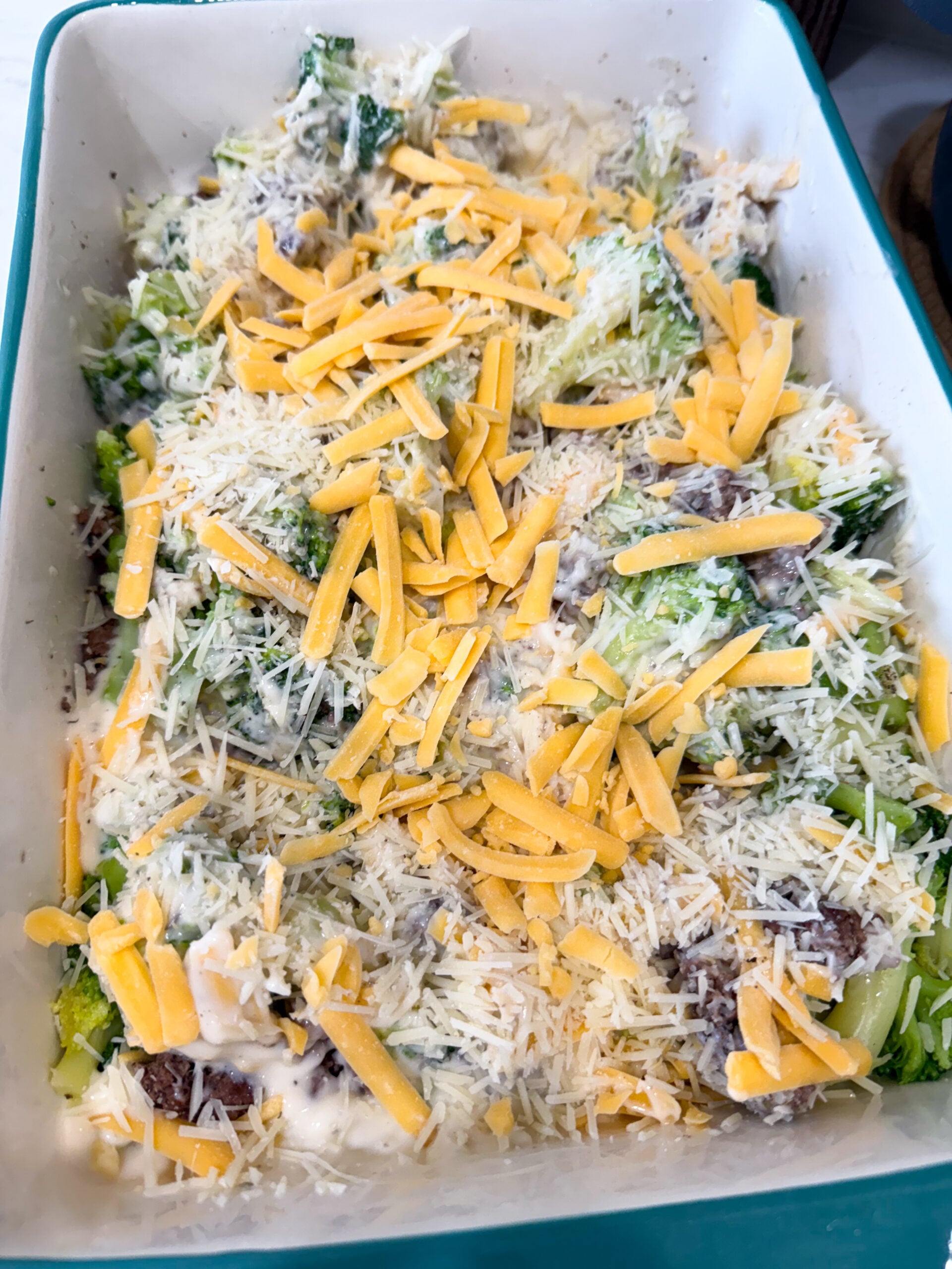cheese sprinkled over the casserole