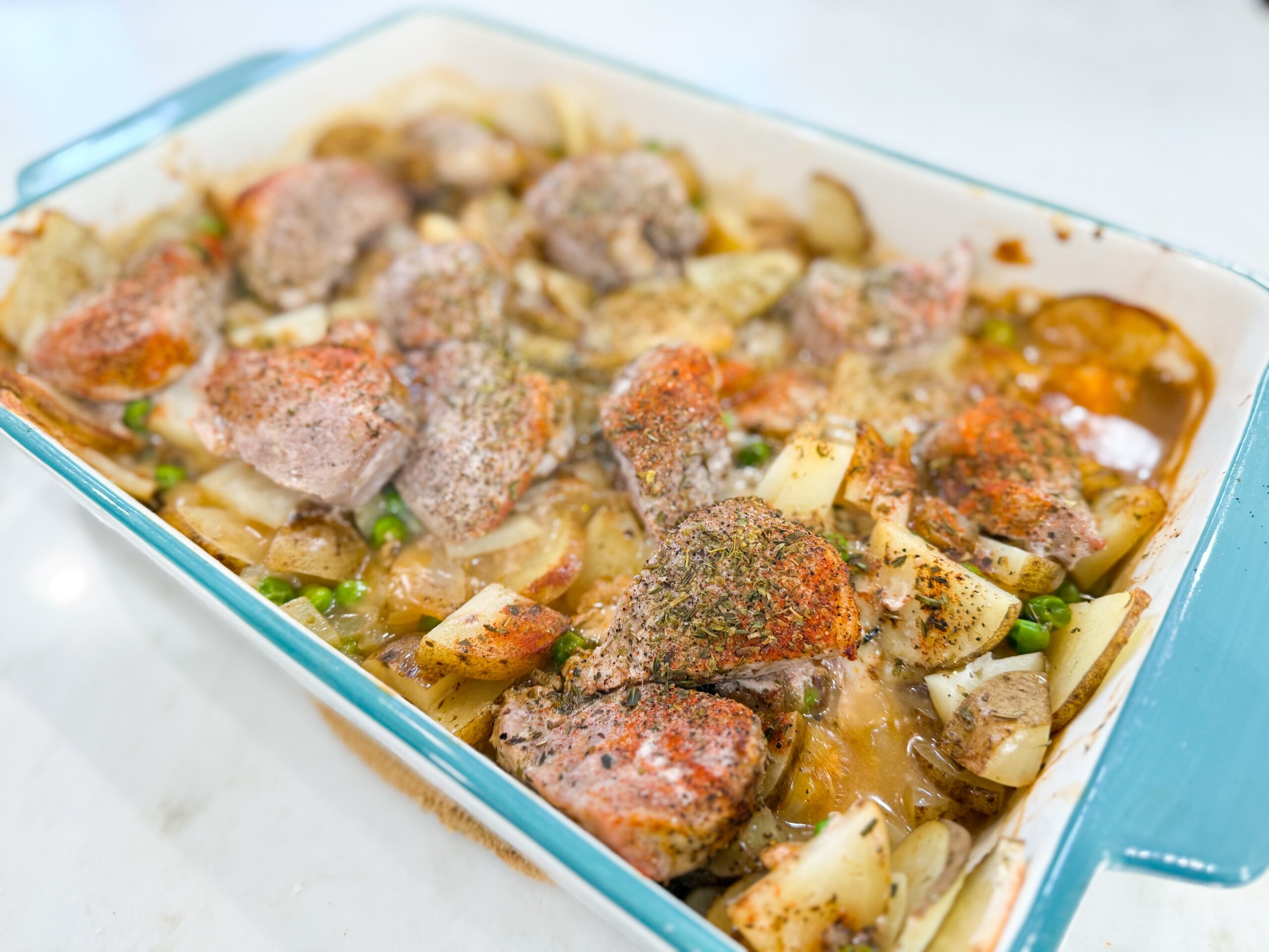 Pork chop and potato casserole baked in a creamy sauce.