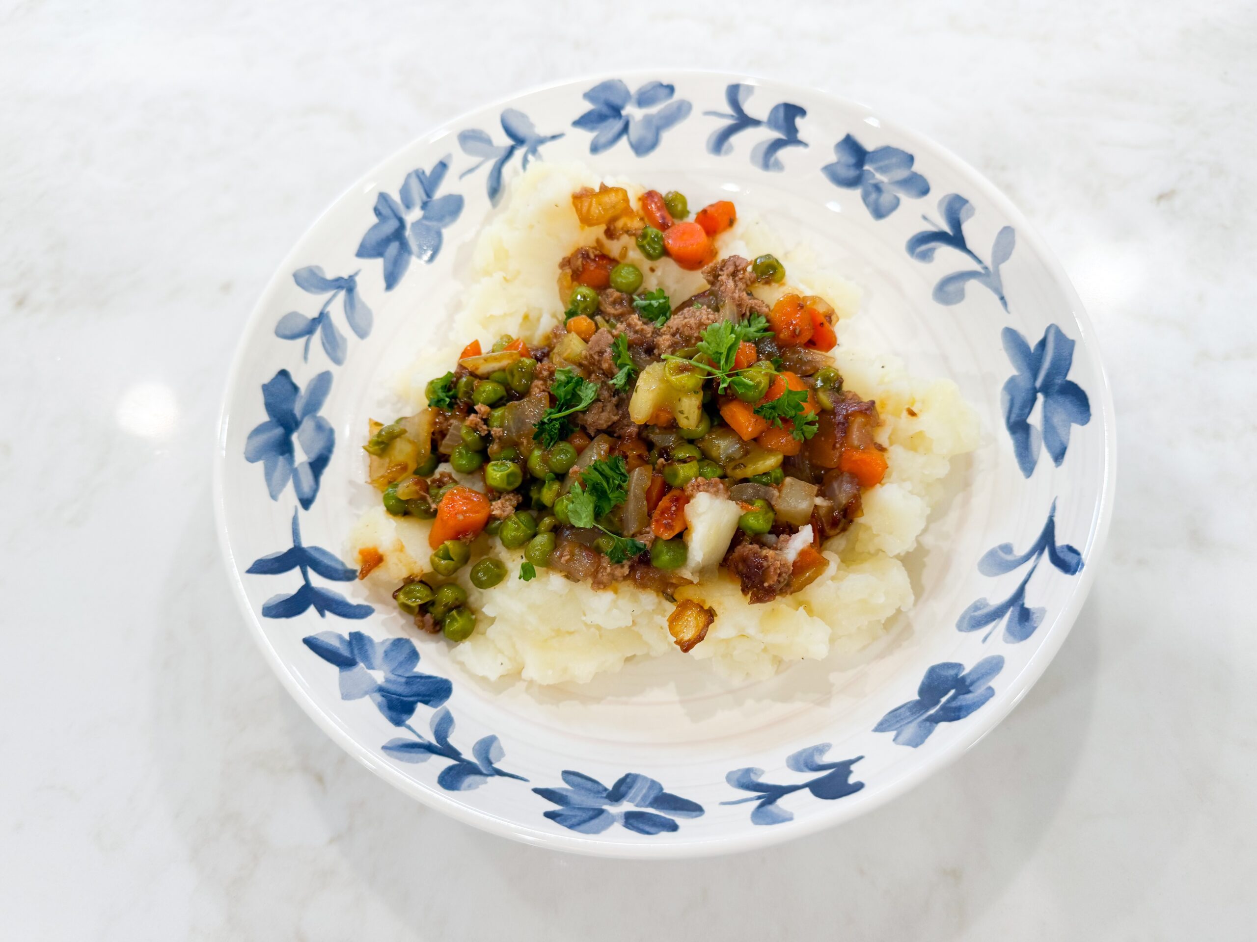 Stovetop shepherdโs pie bowls with ground turkey, vegetables, and mashed potatoes.