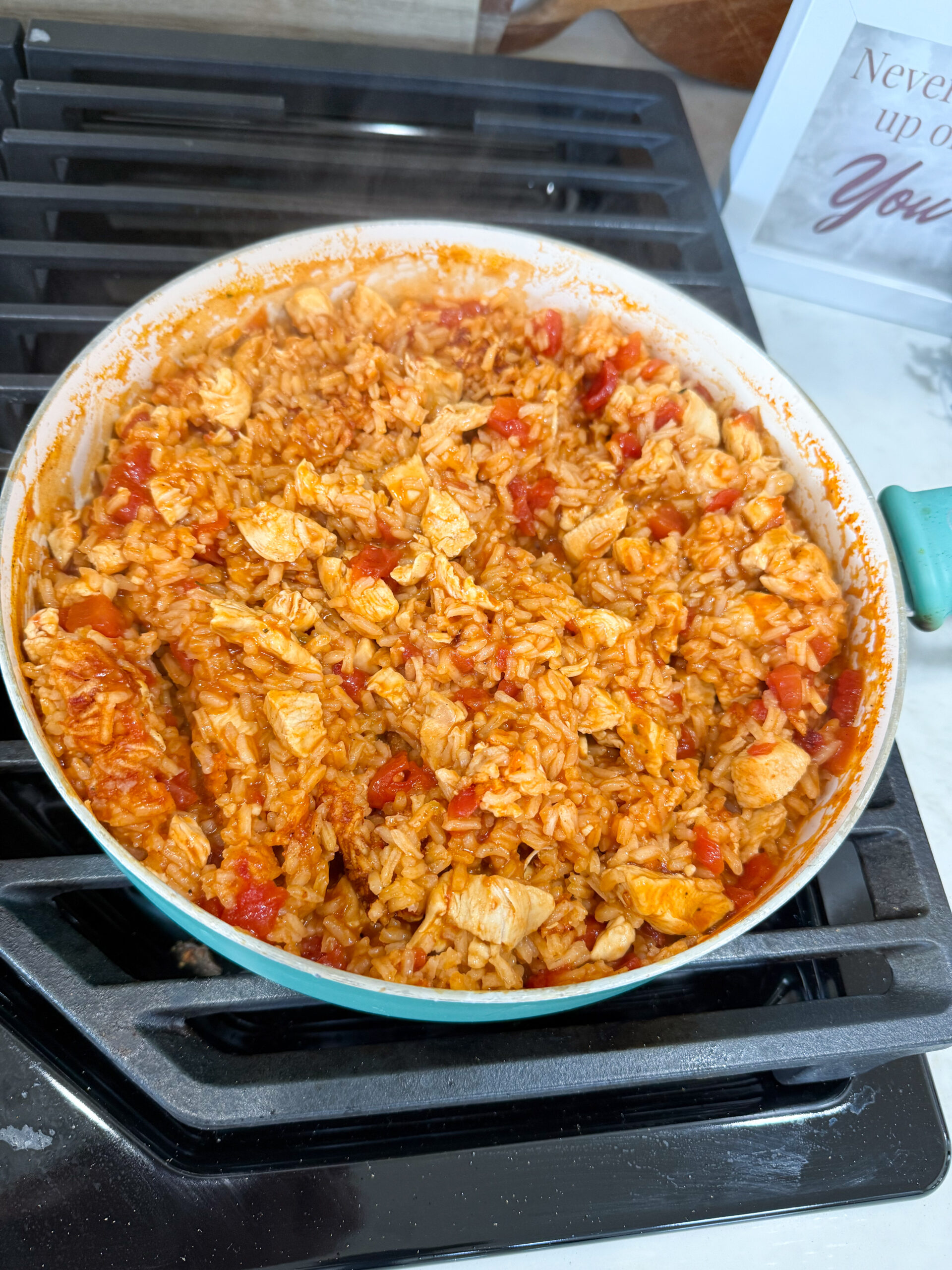 Chicken Taco Rice simmering in a skillet